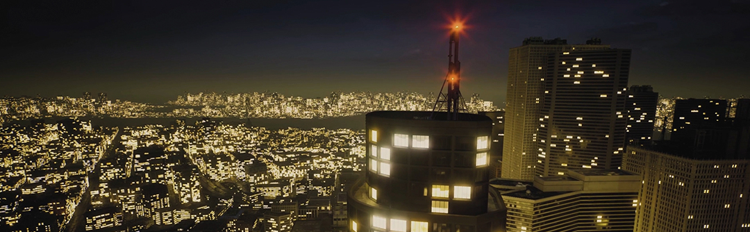 A city skyline with two red lights at the top of a skyscraper