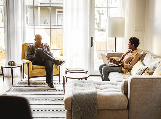 Couple seated in the living room