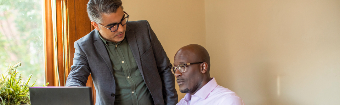 Two financial advisors talk.