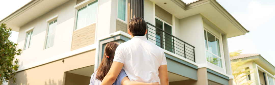 Woman and man looking at home
